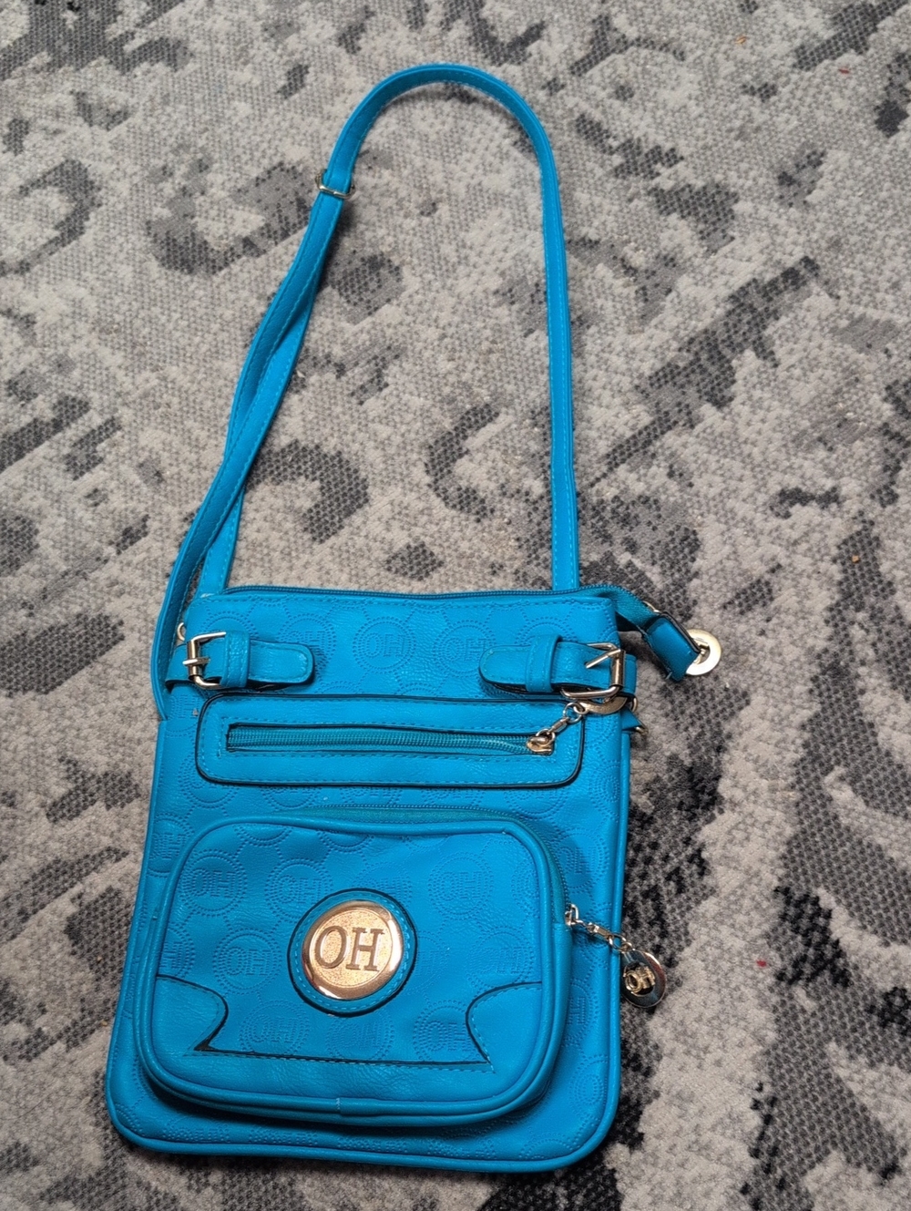 Oh Teal-Blue Crossbody Bag with Gold Emblem